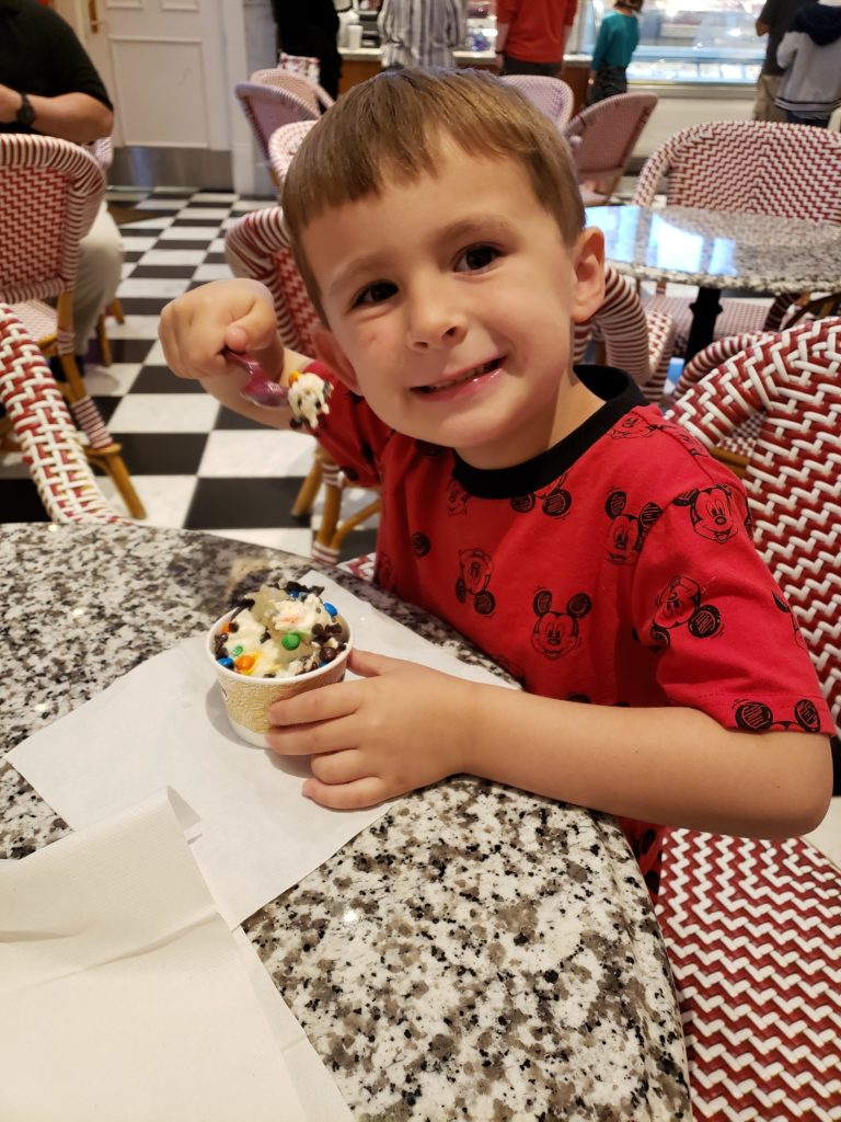 a boy eating ice cream