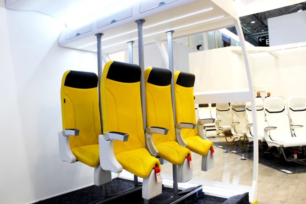 a row of yellow seats