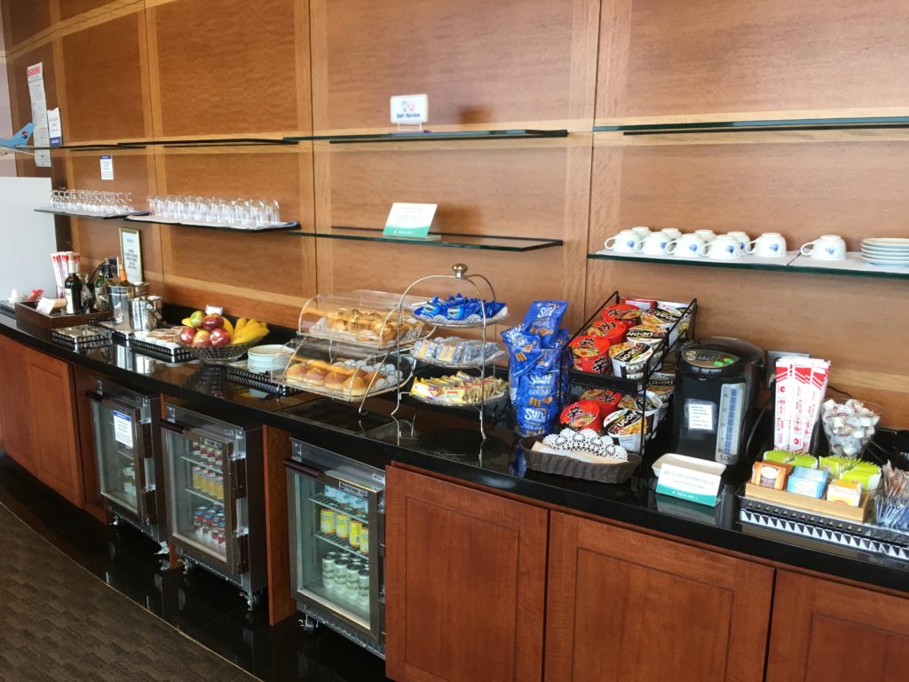 a counter with food and drinks on it