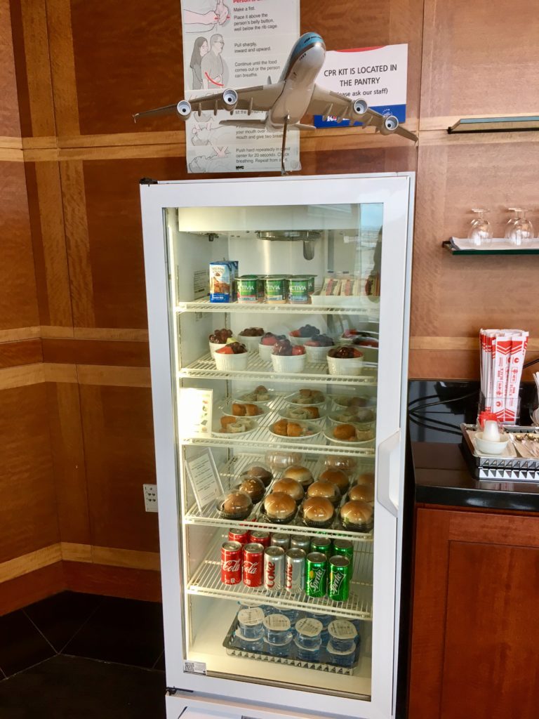 a refrigerator with food on top