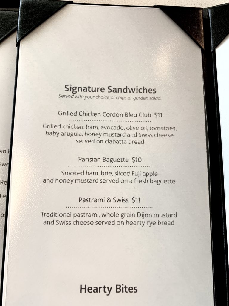 a menu with black text and black text