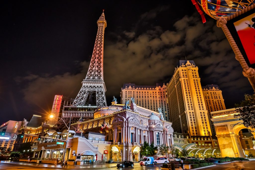 a large building with Paris Las Vegas in the background