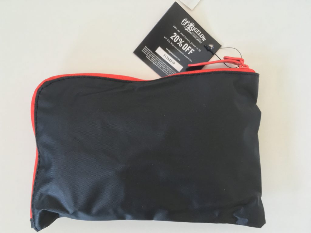 a black and red pouch with a price tag