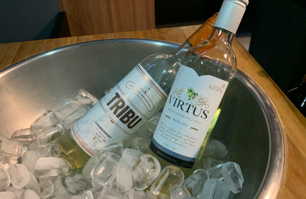 two bottles of wine in a bucket of ice