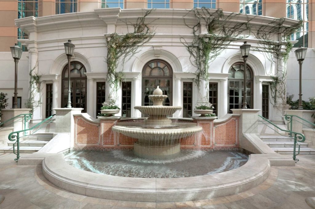 a fountain in front of a building