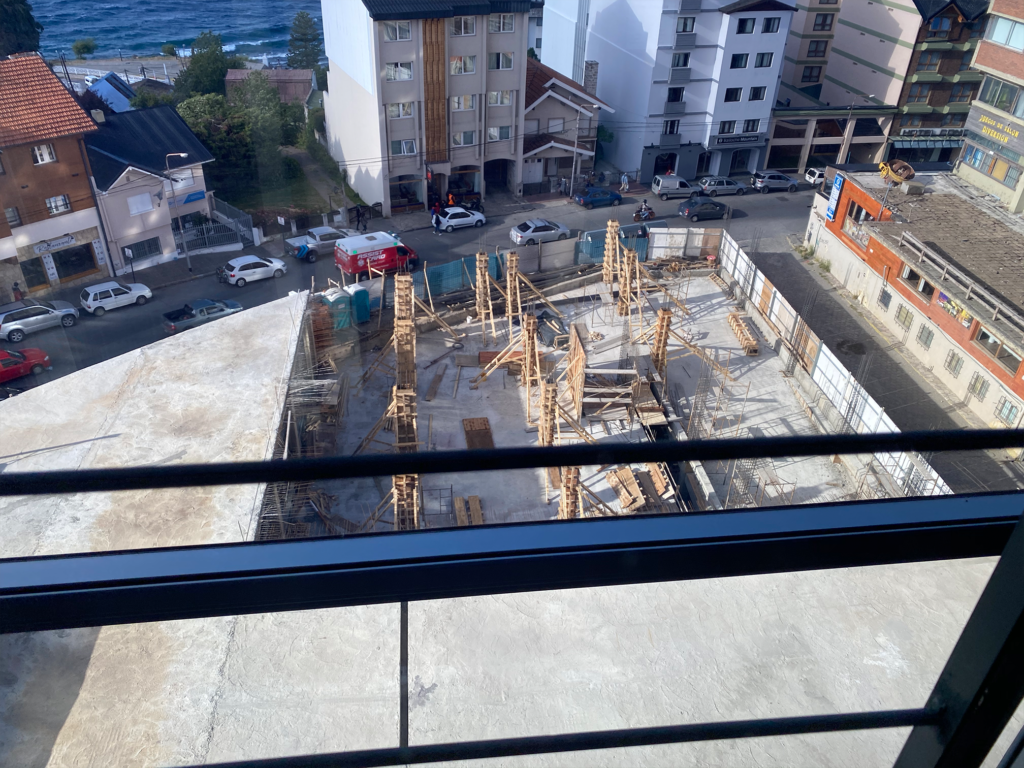 Bird's Eye view of semi-public plaza under construction at the Hampton by Hilton Bariloche. Photo by Giovanni Hashimoto, Point Me To The Plane.