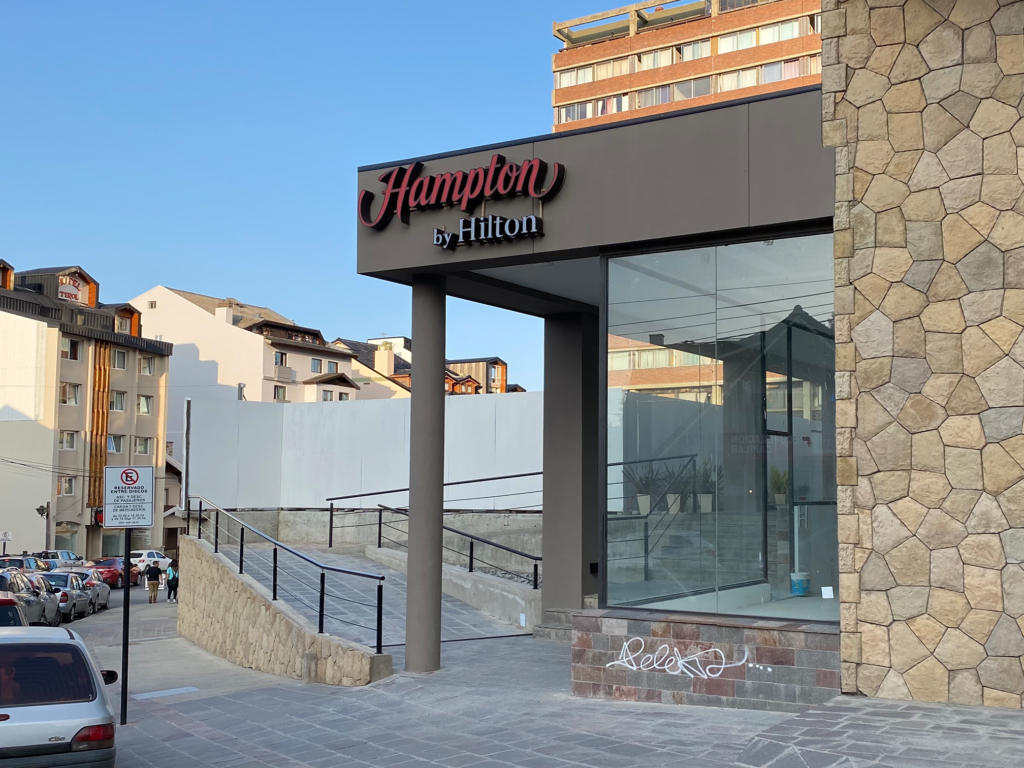The Hampton by Hilton Bariloche's entrance. It doesn't look so great with the construction but should be more inviting once the plaza is complete. Photo by author | Point Me To The Plane.
