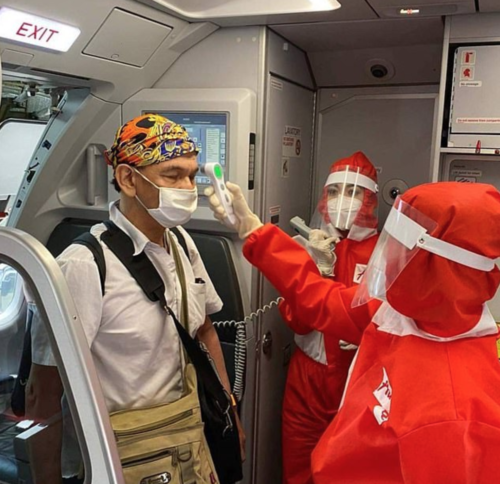 AirAsia PPE Covid-19 Crew Uniform Passenger temperature check