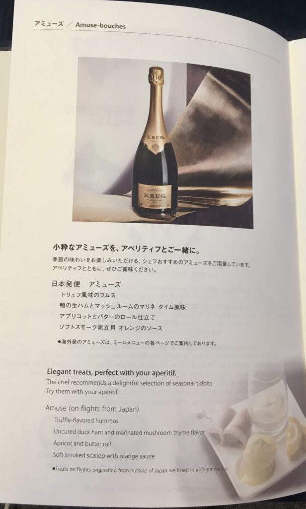 a book with a bottle of champagne