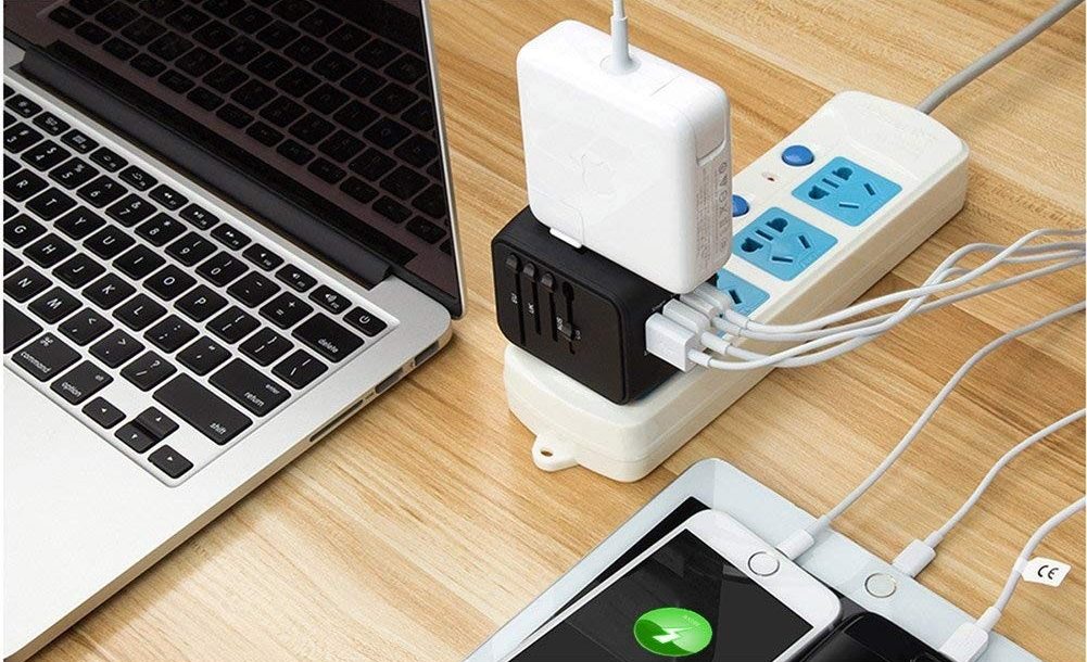 Travel Shopping List: a international adapter with USB-C for fast charging
