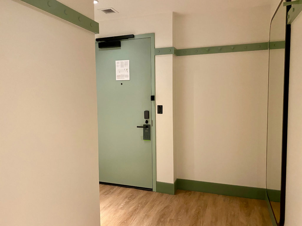a green door in a room