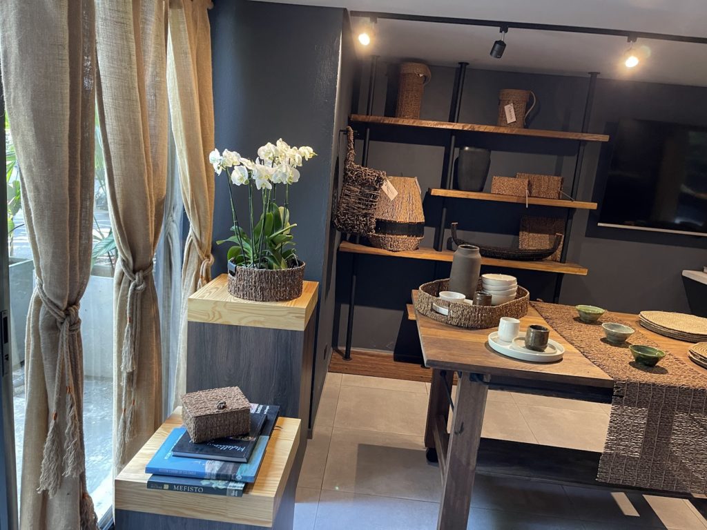 a room with a table and shelves