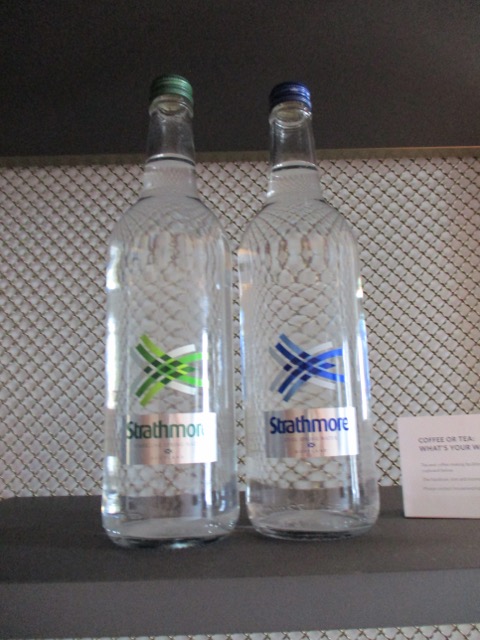 two bottles of water on a table