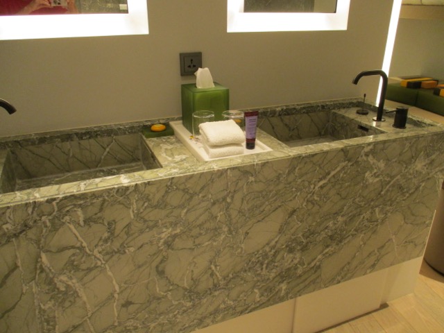 Andaz Seoul master bathroom with a marble counter top