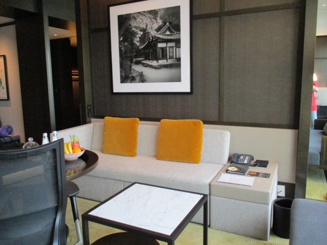 A couch and table in living room at Grand Hyatt Seoul