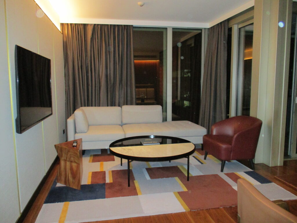 Suite living room with a couch and a coffee table