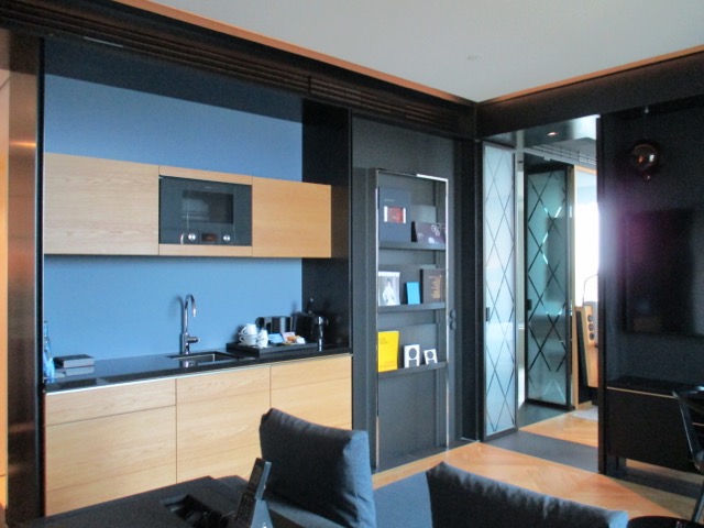 From desk area kitchen and living room space